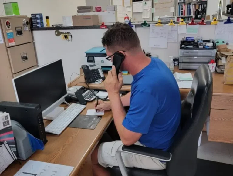 John Adams, owner of Adams Treasure Coast Lock & Safe, at his desk
